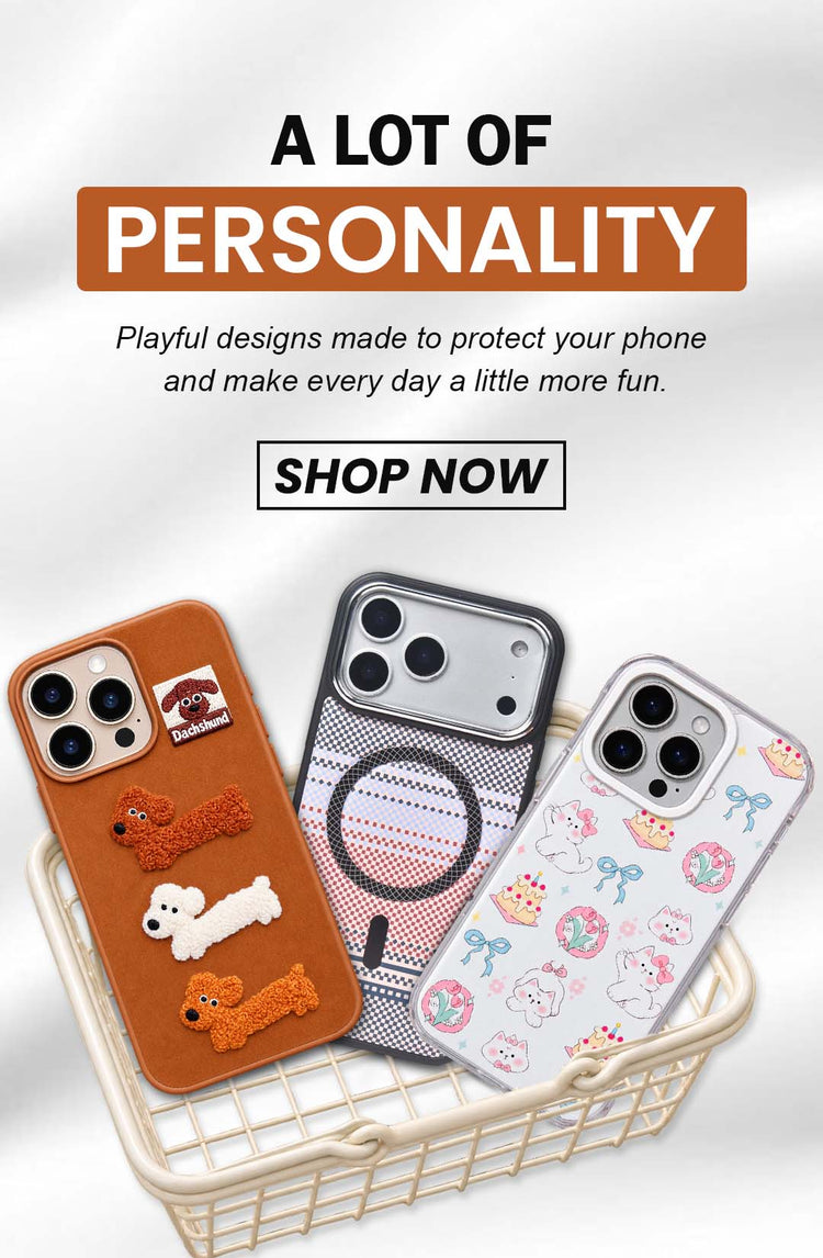 Three phone cases displayed in a white basket with promotional text above reading 'A LOT OF PERSONALITY' and 'SHOP NOW.' The cases feature playful designs: one brown case with dog charms, one gray patterned case with a magnifying glass motif, and one white case with pastel character prints. from belvin.in an 